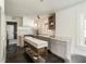 Well-lit kitchen features marble countertops, an island, and stainless steel appliances at 40 Dunnemann Ave, Charleston, SC 29403