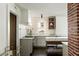 Modern kitchen featuring marble countertops, grey cabinets, and stainless steel appliances at 40 Dunnemann Ave, Charleston, SC 29403