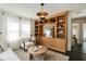 Cozy living room featuring stylish built-ins, modern lighting, and comfortable furnishings at 40 Dunnemann Ave, Charleston, SC 29403