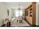 Bright living room with custom shelving, modern lighting, and comfortable seating area at 40 Dunnemann Ave, Charleston, SC 29403