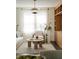 Bright living room with modern lighting, decorative wood shelving, and comfortable seating at 40 Dunnemann Ave, Charleston, SC 29403