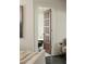 A peek into a modern bathroom from the main bedroom shows elegant design at 40 Dunnemann Ave, Charleston, SC 29403