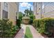 Private backyard oasis with lush landscaping and a charming shed, creating a serene and secluded outdoor space at 44 Savage St, Charleston, SC 29401
