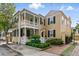 Charming two-story home with a welcoming porch and manicured landscaping at 44 Savage St, Charleston, SC 29401