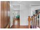 Elegant foyer with hardwood floors and views to the living room at 44 Savage St, Charleston, SC 29401