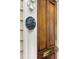 Elegant wooden front door with historic plaque, adding charm and character to this beautiful home at 44 Savage St, Charleston, SC 29401