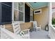Inviting front porch with rocking chairs at 44 Savage St, Charleston, SC 29401