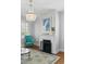 Elegant fireplace and chandelier at 44 Savage St, Charleston, SC 29401