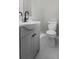 This bathroom offers a gray vanity with matte black fixtures and a modern toilet at 4432 Logwood Drive, Ladson, SC 29456
