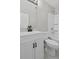 This bathroom features a white vanity, a shower-tub combo, and matte black hardware at 4432 Logwood Drive, Ladson, SC 29456