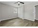 Cozy bedroom with wood floors, a window, and a closet at 4432 Logwood Drive, Ladson, SC 29456