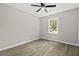 Bedroom with wood floors, a window and light gray walls at 4432 Logwood Drive, Ladson, SC 29456