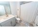 Bathroom with a white shower curtain, a toilet, and a vanity with silver hardware at 4577 Summey St, North Charleston, SC 29405