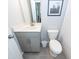 Cozy bathroom featuring a single sink vanity and adjacent toilet with shower at 4577 Summey St, North Charleston, SC 29405