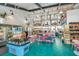 Interior shot of a local grocery store featuring a selection of wines, snacks, and comfortable lounge seating at 4577 Summey St, North Charleston, SC 29405