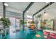 Charming local market with a variety of snacks and beverages, plus tables with pink chairs at 4577 Summey St, North Charleston, SC 29405