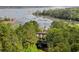 Stunning aerial view of a waterfront property surrounded by lush greenery and serene water views at 478 Commonwealth Rd, Mount Pleasant, SC 29466