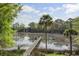 Waterfront backyard featuring a dock with a picturesque view of the river at 478 Commonwealth Rd, Mount Pleasant, SC 29466