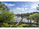 Aerial view of a backyard featuring a long dock and stunning river views at 478 Commonwealth Rd, Mount Pleasant, SC 29466