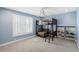 Well-lit ' bedroom with a bunk bed and blue walls at 478 Commonwealth Rd, Mount Pleasant, SC 29466
