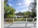 River view deck with a pool and a dock, surrounded by trees at 478 Commonwealth Rd, Mount Pleasant, SC 29466