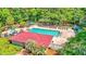 Community pool surrounded by lush greenery and lounge chairs, perfect for relaxation and recreation at 478 Commonwealth Rd, Mount Pleasant, SC 29466