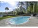 Exterior photo showing an in-ground pool with fenced backyard and private dock at 478 Commonwealth Rd, Mount Pleasant, SC 29466