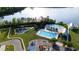 Aerial shot of pool and playground with pond view at 484 Trotters Ln, Moncks Corner, SC 29461