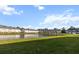 Beautiful backyard with a scenic pond view and well-maintained grassy area at 484 Trotters Ln, Moncks Corner, SC 29461