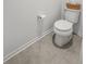Bathroom with modern toilet, tile flooring, and neutral wall color at 484 Trotters Ln, Moncks Corner, SC 29461