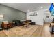 Cozy living room with comfortable seating, stylish decor, and natural light at 484 Trotters Ln, Moncks Corner, SC 29461