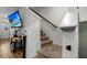 Carpeted staircase with a wooden handrail offers access to the upper level at 484 Trotters Ln, Moncks Corner, SC 29461