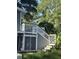 View of a home with a wooden deck and stairs at 4869 Slans Island Rd, Hollywood, SC 29449