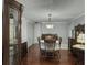 Dining room with wood furnishings, traditional chandelier, and inviting atmosphere at 4869 Slans Island Rd, Hollywood, SC 29449