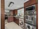 Well-equipped kitchen with stainless steel appliances, custom cabinetry, and a window view at 4869 Slans Island Rd, Hollywood, SC 29449