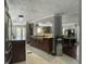 Kitchen area with modern appliances, custom cabinets, and seamless access to dining at 4869 Slans Island Rd, Hollywood, SC 29449