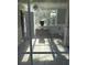 View into a living room through a dirty glass door at 4869 Slans Island Rd, Hollywood, SC 29449