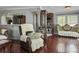 Stylish living room view that connects to the kitchen, showcasing natural light and an open layout at 4869 Slans Island Rd, Hollywood, SC 29449