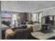 Relaxing living room with fireplace, TV, and comfortable seating, great for entertainment and gatherings at 4869 Slans Island Rd, Hollywood, SC 29449