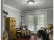 Functional office space with ample natural light, featuring a massage chair and organized desk area, perfect for productivity at 4869 Slans Island Rd, Hollywood, SC 29449