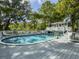 Inviting pool area with a spacious deck, perfect for outdoor relaxation and entertaining near the house at 4869 Slans Island Rd, Hollywood, SC 29449