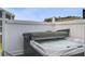 Relaxing hot tub with cover, enclosed by a white fence, for privacy and leisure at 5049 Song Sparrow Way, Summerville, SC 29483