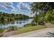 Scenic view of the community's Village Pond, perfect for relaxing and enjoying nature at 5049 Song Sparrow Way, Summerville, SC 29483