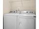 Modern laundry room with white washer and dryer, offering convenience and functionality at 505 Eastern Isle Ave, Summerville, SC 29486