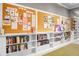 Community library with white bookshelves and corkboards at 505 Eastern Isle Ave, Summerville, SC 29486
