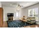 Comfortable living room with ample natural light and a stylish rug at 505 Eastern Isle Ave, Summerville, SC 29486