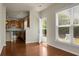 Inviting living room with hardwood floors and a view of the modern kitchen area at 505 Eastern Isle Ave, Summerville, SC 29486