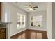 Hardwood floors, windows with blinds, and natural light define this airy living space at 505 Eastern Isle Ave, Summerville, SC 29486