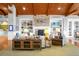 Comfortable lounge area featuring a stone fireplace and built-in shelving at 505 Eastern Isle Ave, Summerville, SC 29486