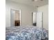 Comfortable main bedroom with a doorway to an en-suite bathroom and another to a closet at 505 Eastern Isle Ave, Summerville, SC 29486